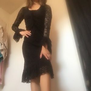 Medium. Back laced dress. Tight fitted.